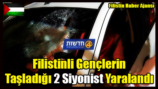 Filistinli Genclerin Tasladigi 2 Siyonist Yaralandi