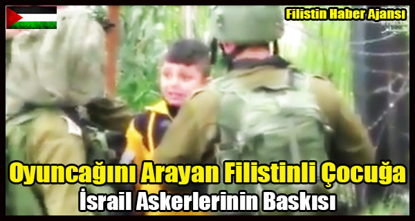 Oyuncagini Arayan Filistinli Cocuga Israil Askerlerinin Baskisi
